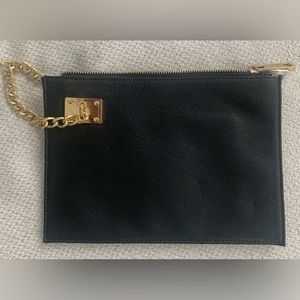 Black with gold clutch evening bag.